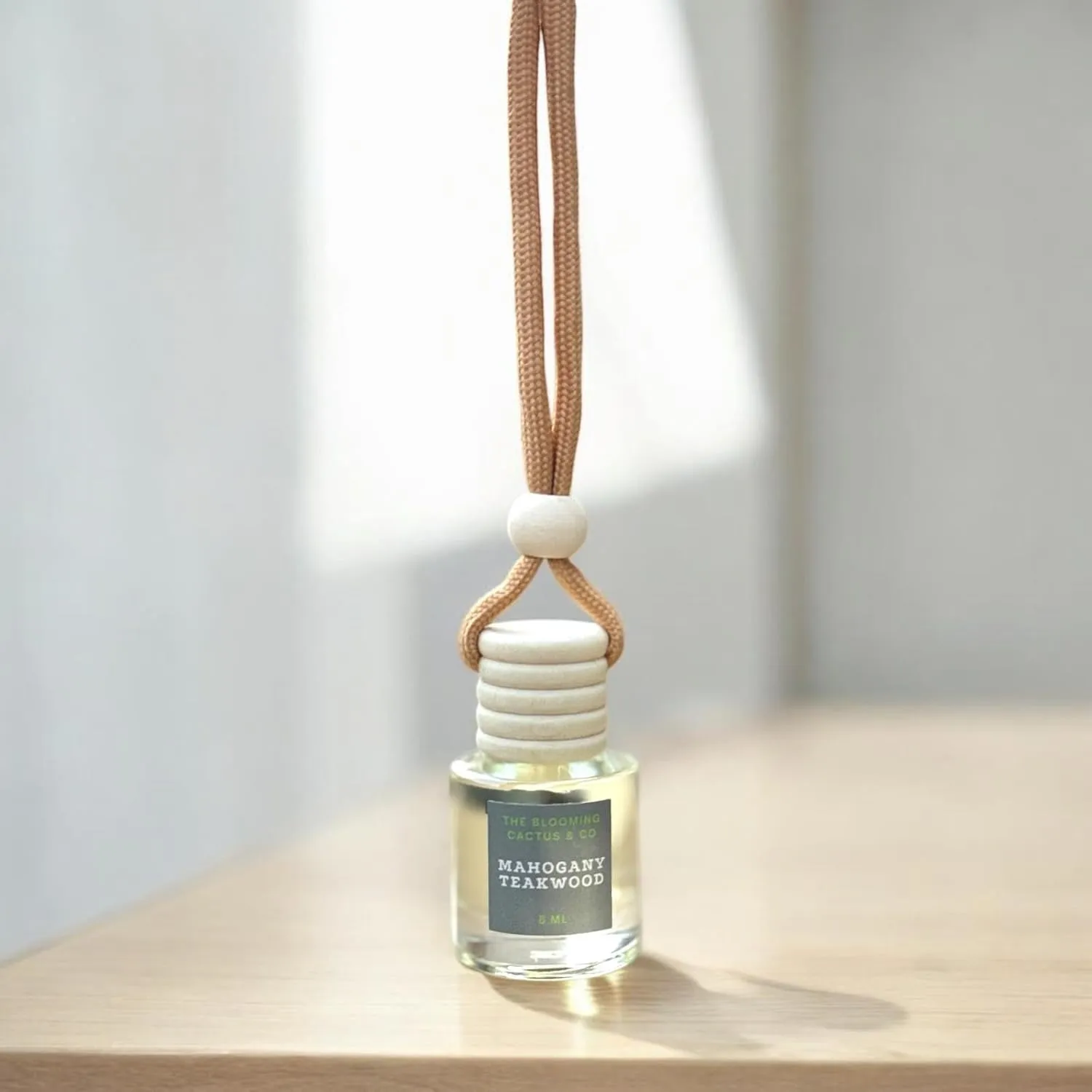 Car Air Freshener with 1 Oz Refill included | Car scented on the go | Car Air Freshener | Long Lasting Hanging Fragrance | Phthalate Free Fragrance. (Mahogany Teakwood, 8 ml)