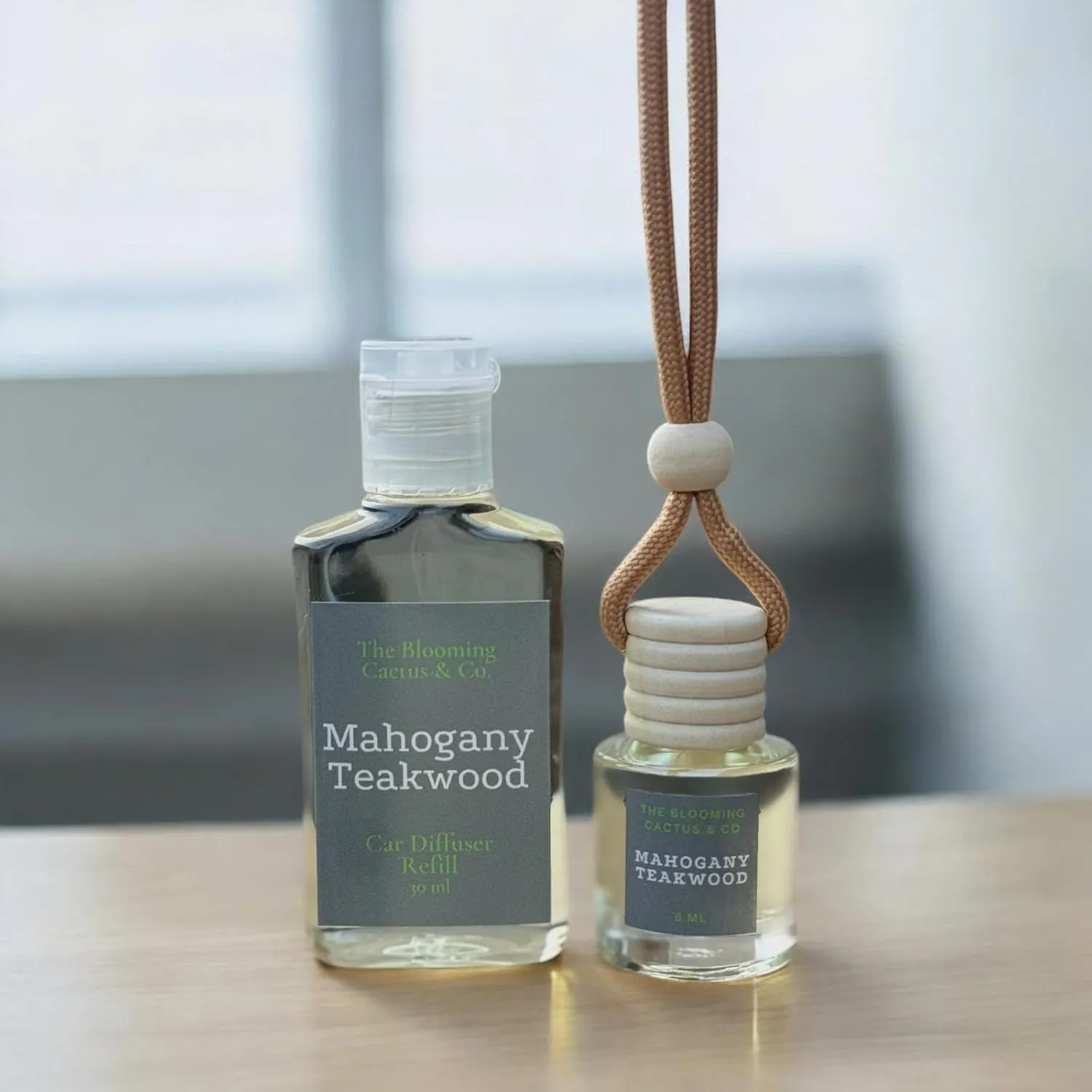 Car Air Freshener with 1 Oz Refill included | Car scented on the go | Car Air Freshener | Long Lasting Hanging Fragrance | Phthalate Free Fragrance. (Mahogany Teakwood, 8 ml)