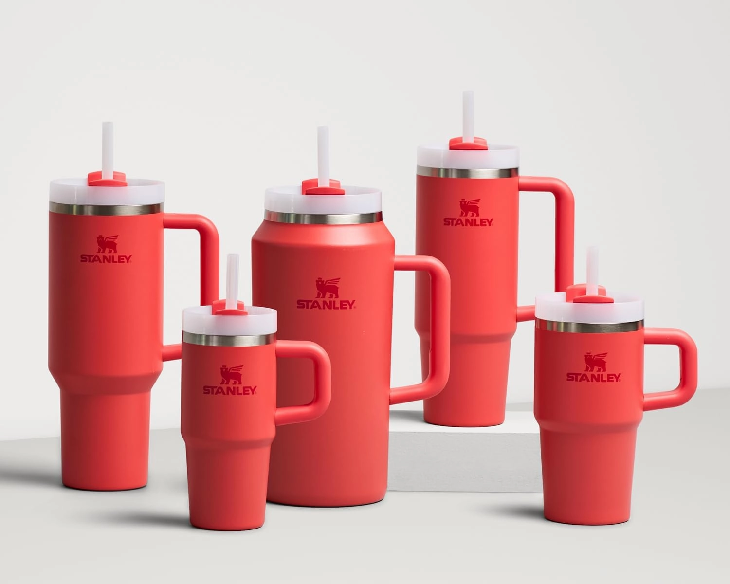 Stanley Quencher H2.0 Tumbler with Handle and Straw 30 oz | Flowstate 3-Position Lid | Cup Holder Compatible for Travel | Insulated Stainless Steel Cup | BPA-Free | Hot Coral