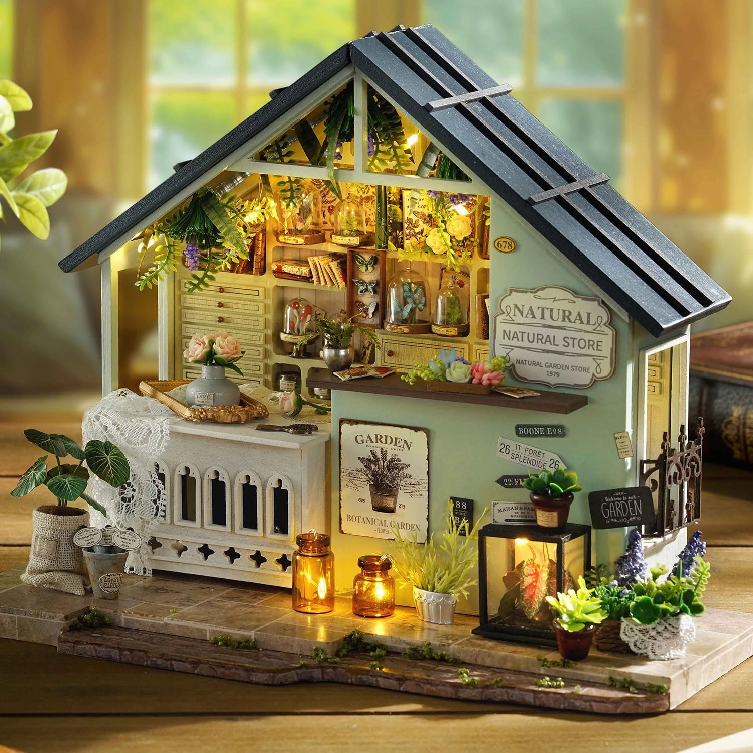 TuKIIE DIY Miniature House Kit with Furniture, 1:24 Scale Creative Room Mini Wooden Dollhouse Book Nook Plus Dust Proof & Music Movement for Kids Teens Adults(Plants Studio)